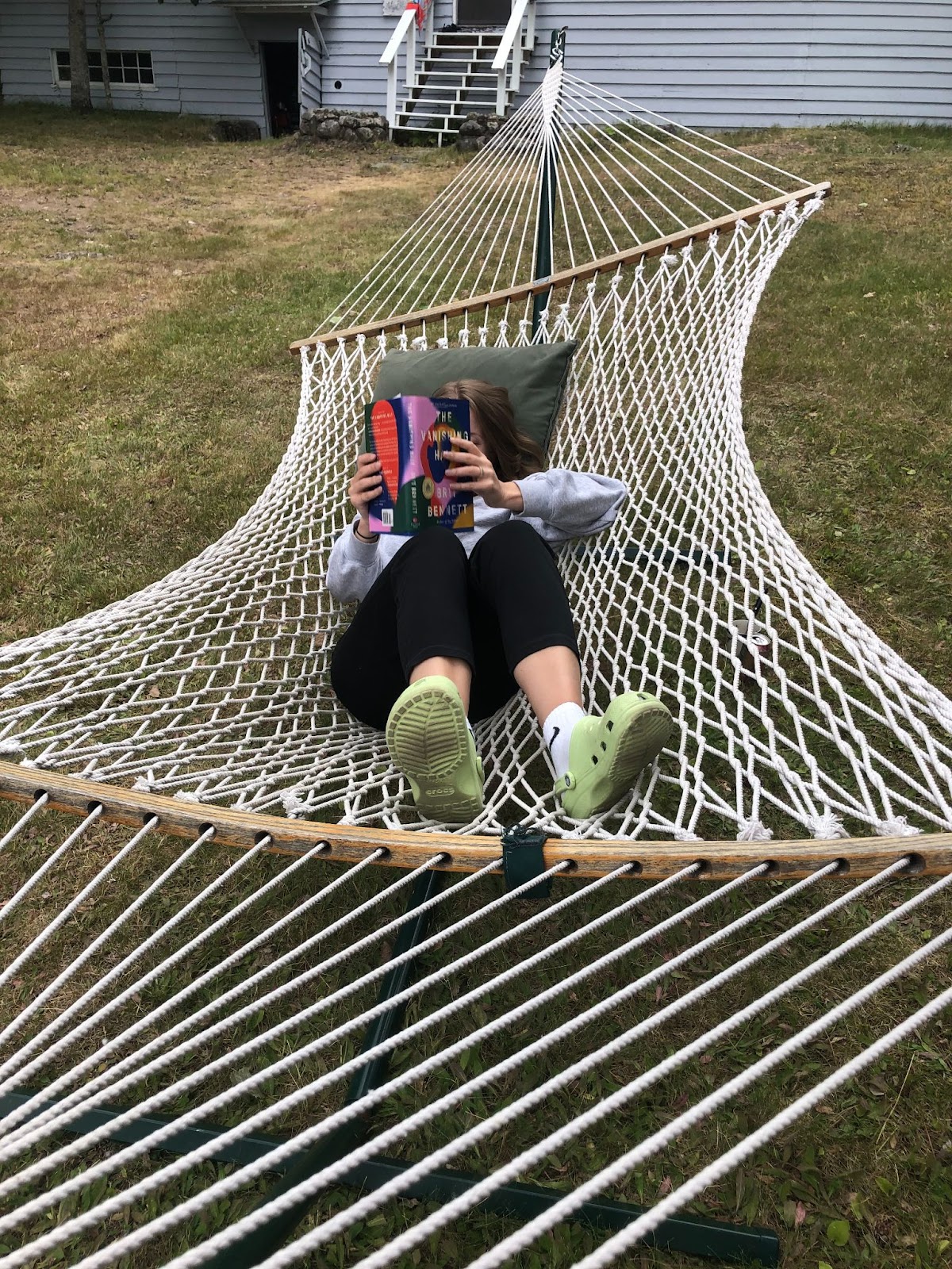 Pam in a hammock outside the cabin she co-owns with relatives in Northern Minnesota.